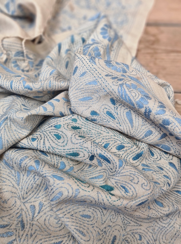 A tussar silk scarf/shawl hand-embroidered with traditional motifs by a NGO in West Bengal.