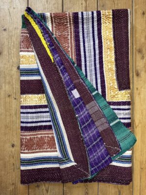 Exquisite vintage Kantha quilt featuring authentic hand-stitched Indian patchwork, responsibly sourced and perfect as unique homeware.