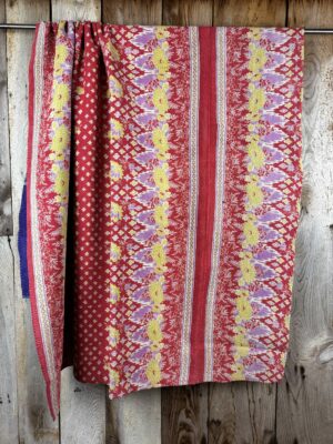 Exquisite vintage Kantha quilt featuring authentic hand-stitched Indian patchwork, responsibly sourced and perfect as unique homeware.