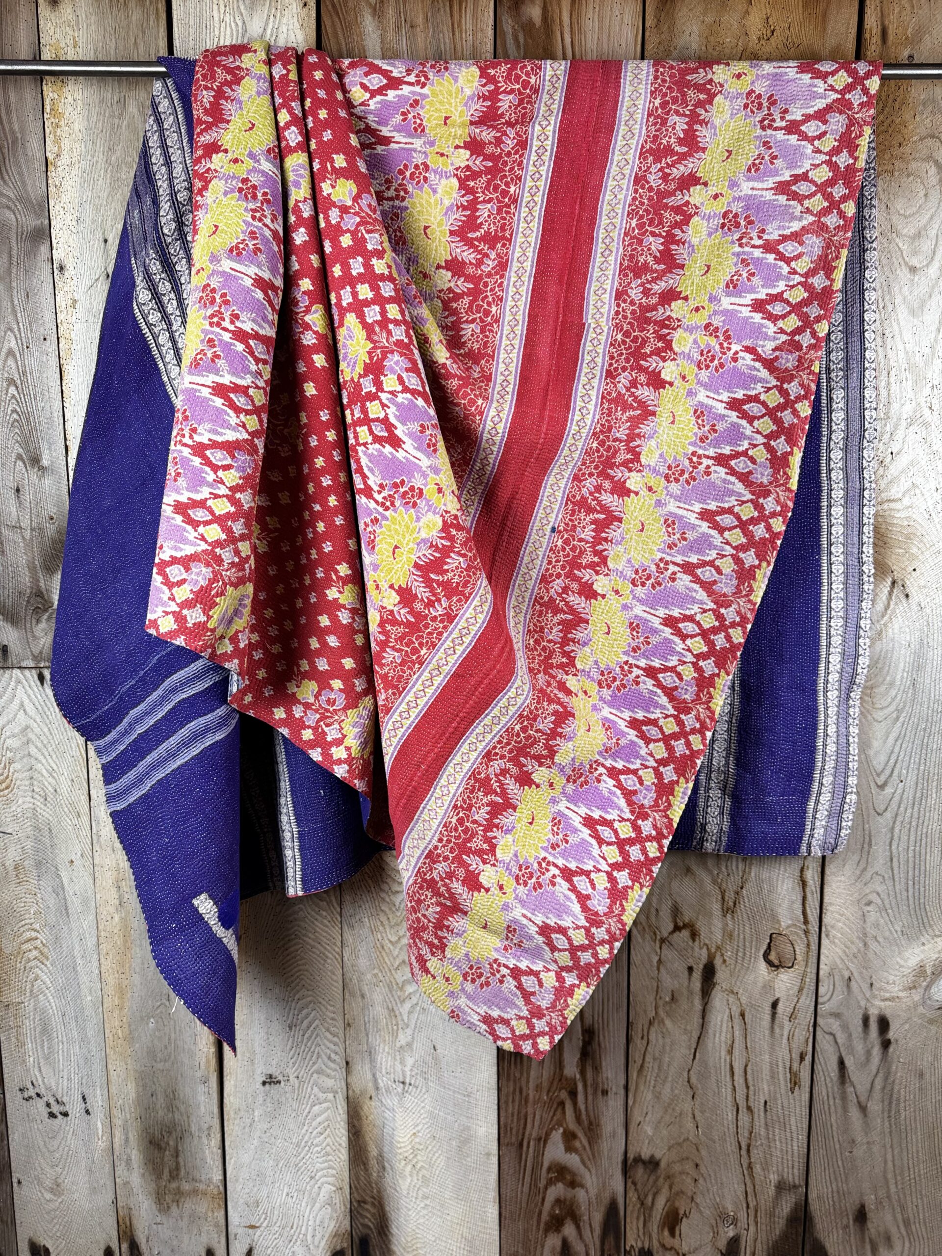 Exquisite vintage Kantha quilt featuring authentic hand-stitched Indian patchwork, responsibly sourced and perfect as unique homeware.
