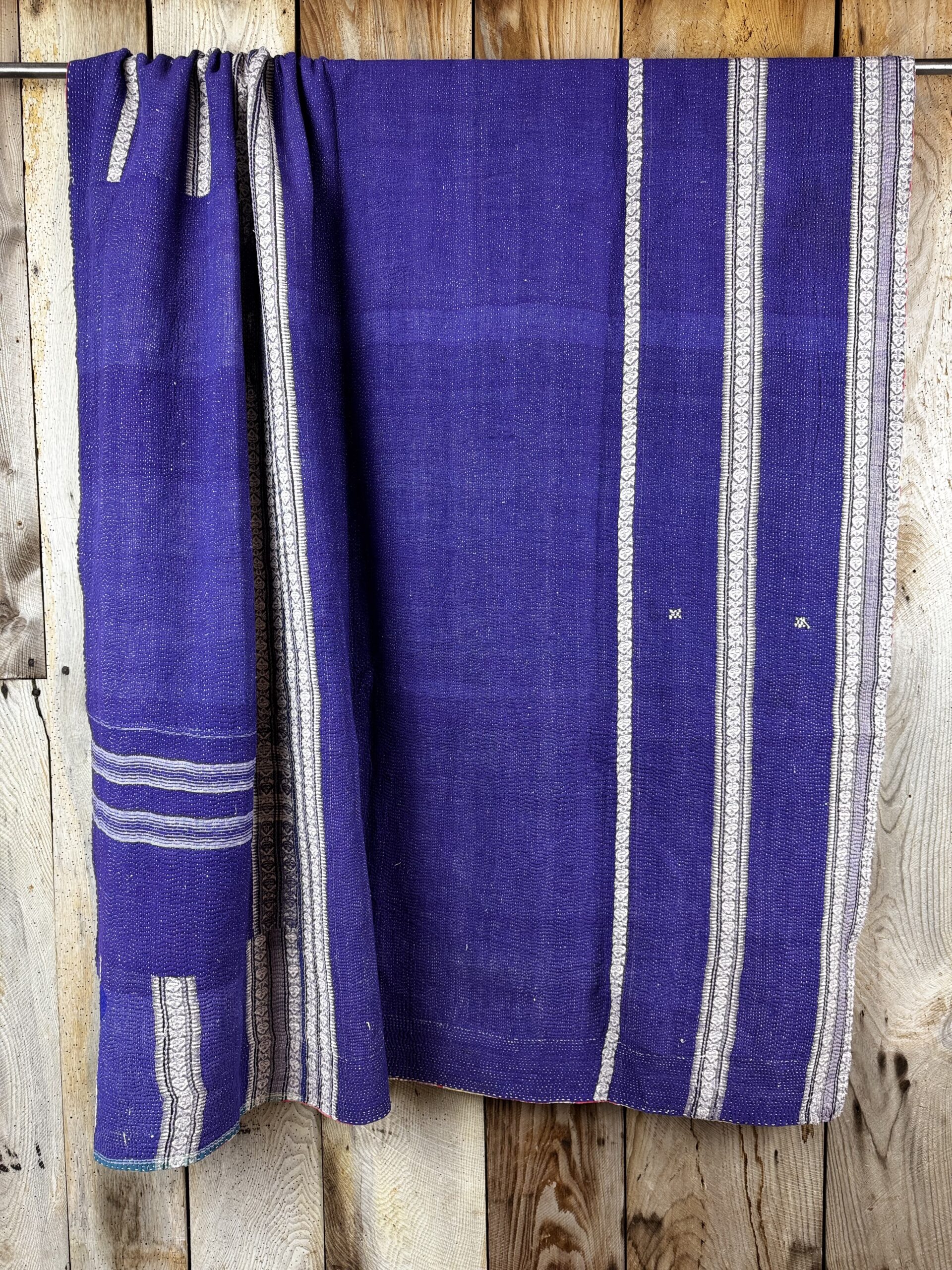 Exquisite vintage Kantha quilt featuring authentic hand-stitched Indian patchwork, responsibly sourced and perfect as unique homeware.