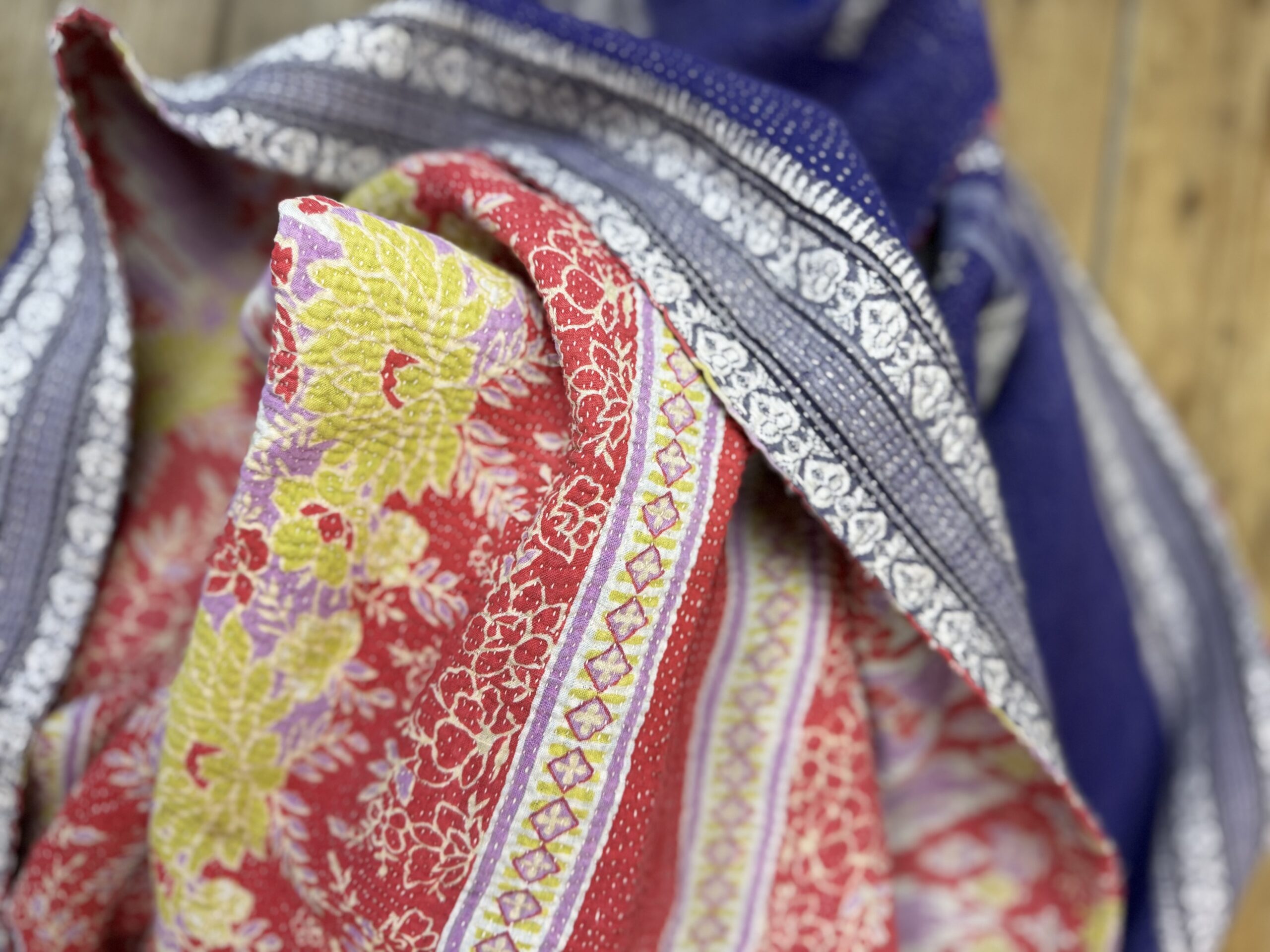 Exquisite vintage Kantha quilt featuring authentic hand-stitched Indian patchwork, responsibly sourced and perfect as unique homeware.
