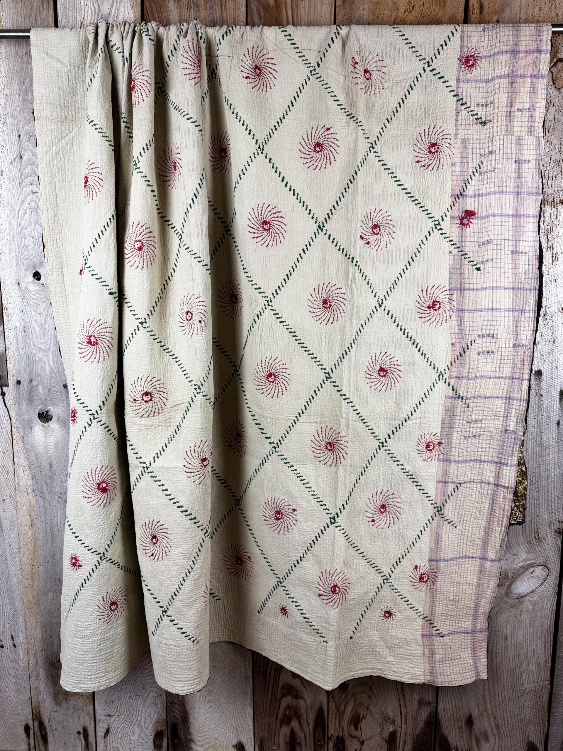 Exquisite vintage Kantha quilt featuring authentic hand-stitched Indian patchwork, responsibly sourced and perfect as unique homeware.