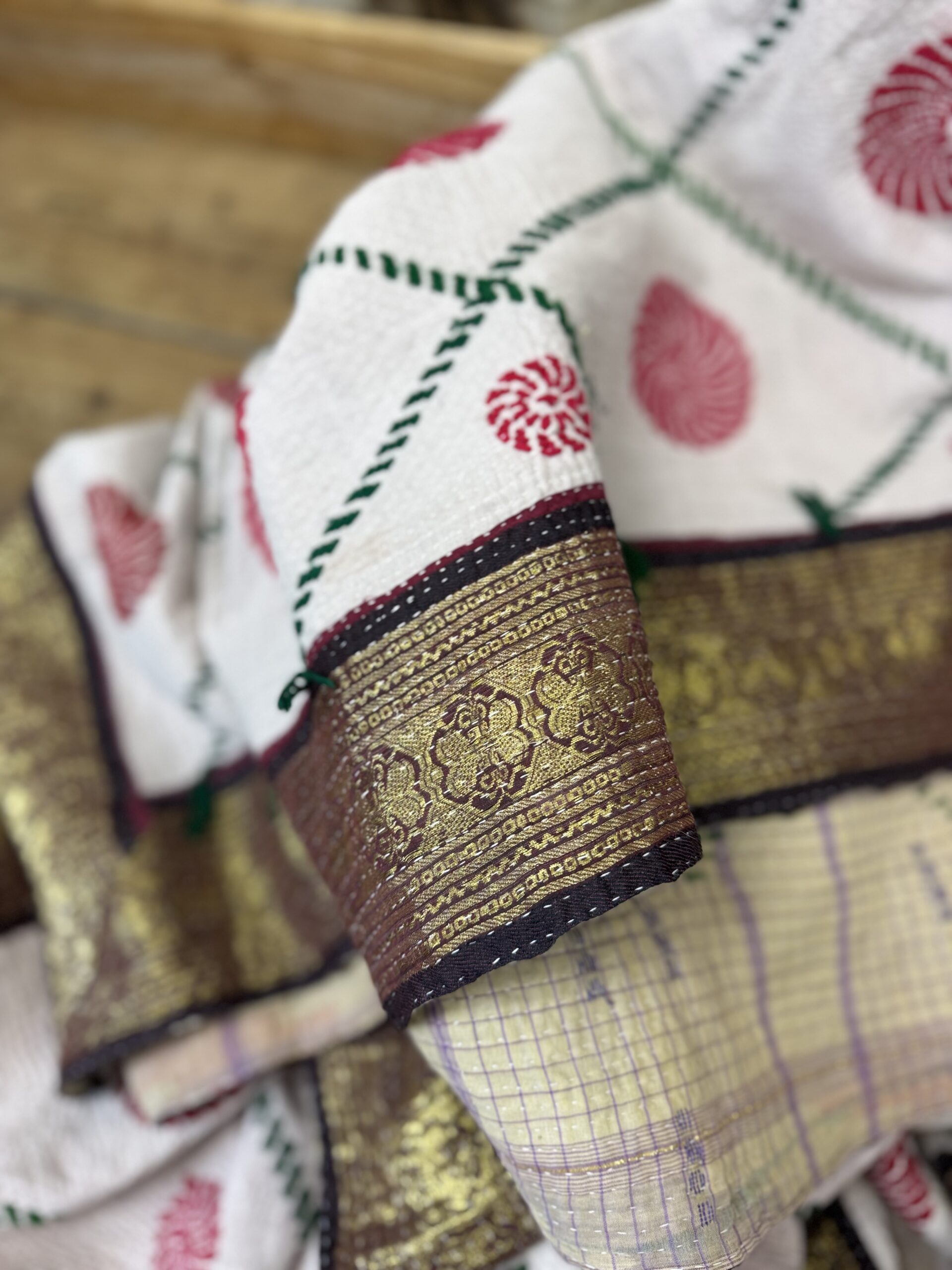 Exquisite vintage Kantha quilt featuring authentic hand-stitched Indian patchwork, responsibly sourced and perfect as unique homeware.