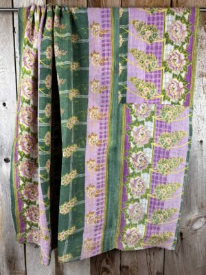 Exquisite vintage Kantha quilt featuring authentic hand-stitched Indian patchwork, responsibly sourced and perfect as unique homeware.