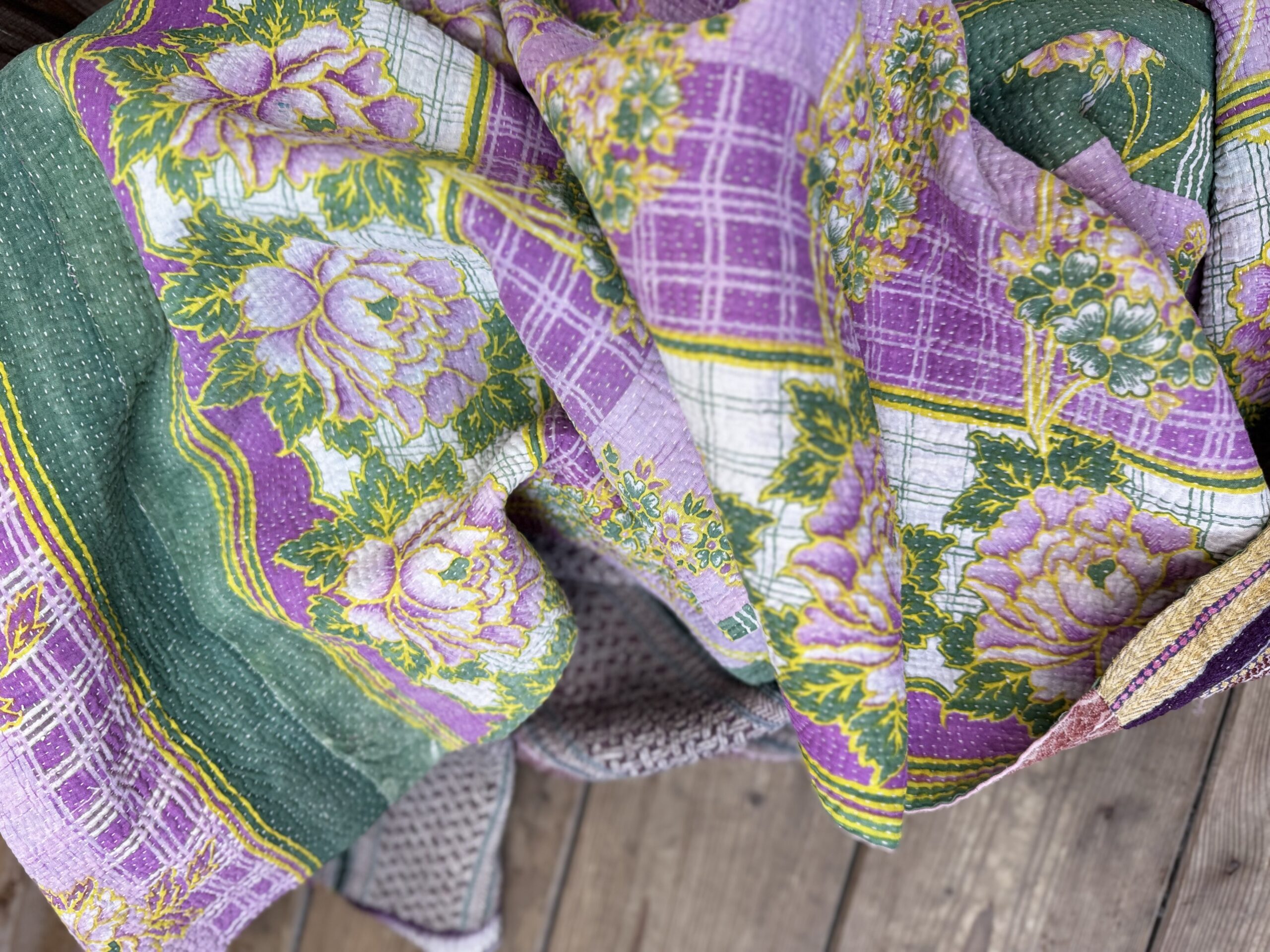 Exquisite vintage Kantha quilt featuring authentic hand-stitched Indian patchwork, responsibly sourced and perfect as unique homeware.