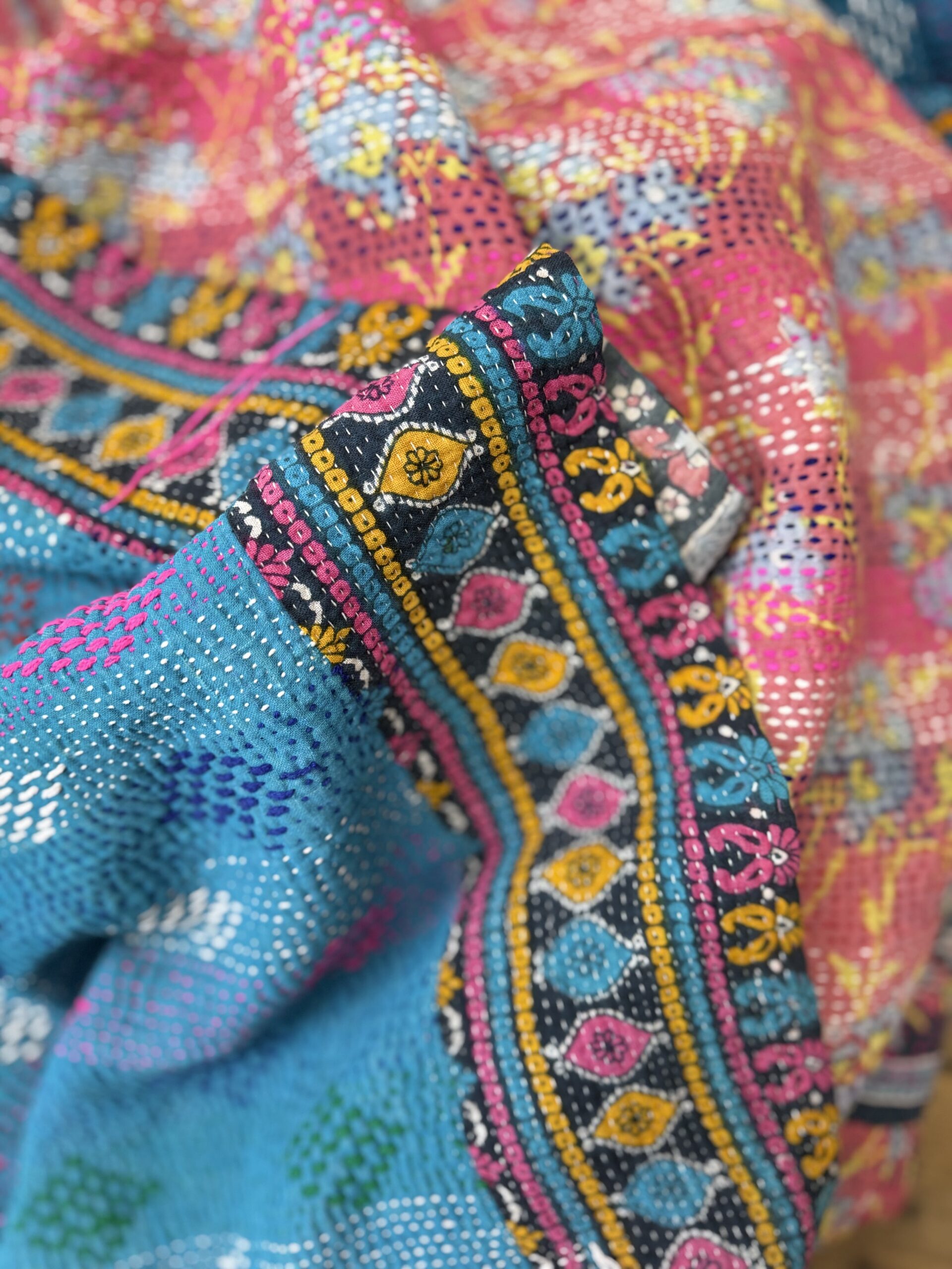 Exquisite vintage Kantha quilt featuring authentic hand-stitched Indian patchwork, responsibly sourced and perfect as unique homeware.