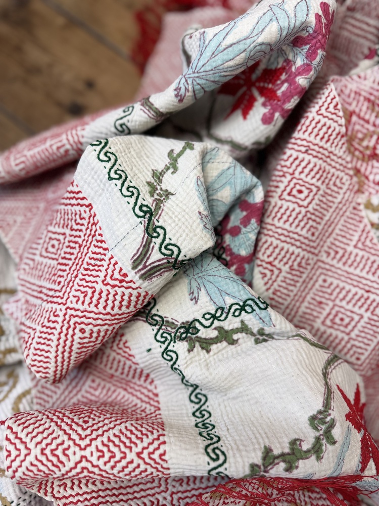 Exquisite vintage block printed Kantha quilt featuring authentic hand-stitched motifs and embroidery, responsibly sourced and perfect as unique homeware.
