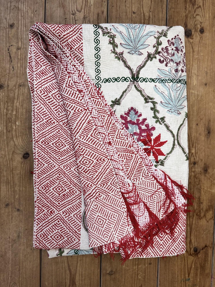 Exquisite vintage block printed Kantha quilt featuring authentic hand-stitched motifs and embroidery, responsibly sourced and perfect as unique homeware.