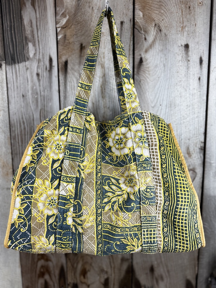 Colourful cotton kantha bags, pockets and purses, great for organising the smaller things in life. Made from recycled kantha quilts for the perfect accessory.