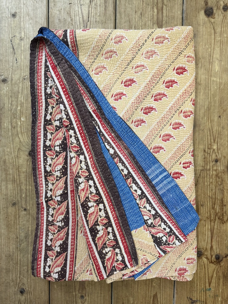 Exquisite vintage Kantha quilt featuring authentic hand-stitched Indian patchwork, responsibly sourced and perfect as unique homeware.
