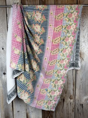 Exquisite vintage Kantha quilt featuring authentic hand-stitched Indian patchwork, responsibly sourced and perfect as unique homeware.