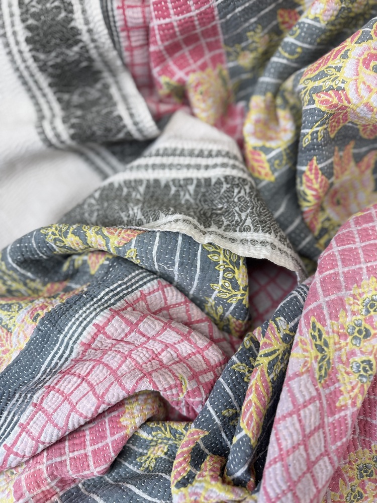 Exquisite vintage Kantha quilt featuring authentic hand-stitched Indian patchwork, responsibly sourced and perfect as unique homeware.