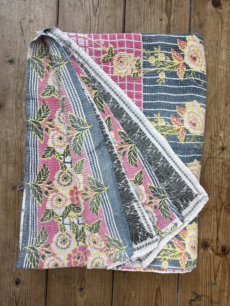 Exquisite vintage Kantha quilt featuring authentic hand-stitched Indian patchwork, responsibly sourced and perfect as unique homeware.