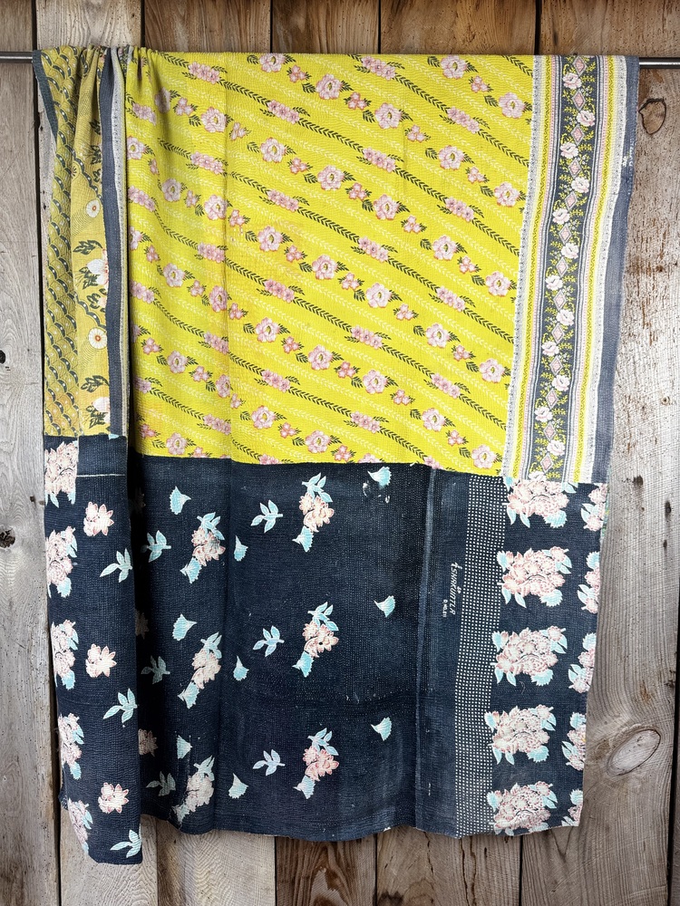 Exquisite vintage Kantha quilt featuring authentic hand-stitched Indian patchwork, responsibly sourced and perfect as unique homeware.
