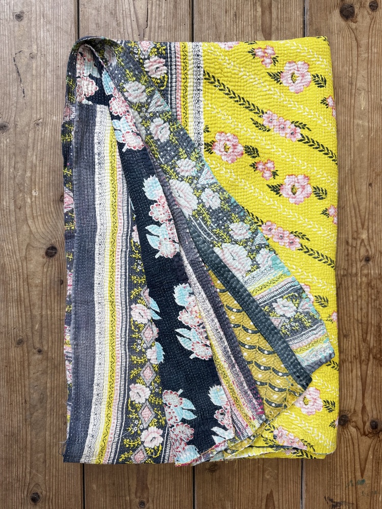 Exquisite vintage Kantha quilt featuring authentic hand-stitched Indian patchwork, responsibly sourced and perfect as unique homeware.
