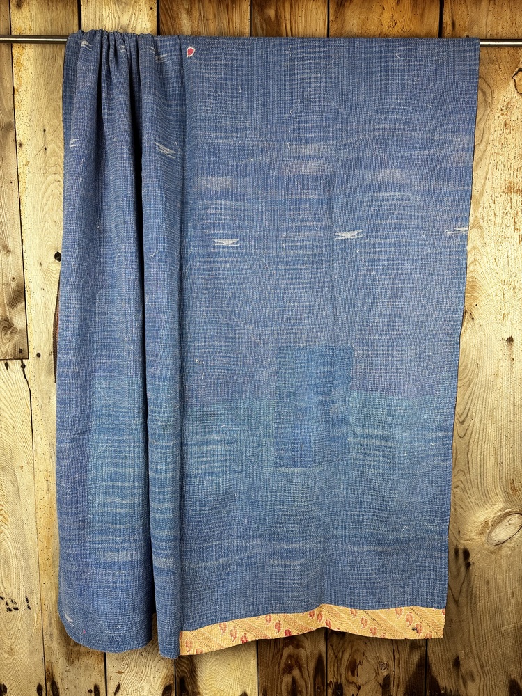 Exquisite vintage Kantha quilt featuring authentic hand-stitched Indian patchwork, responsibly sourced and perfect as unique homeware.