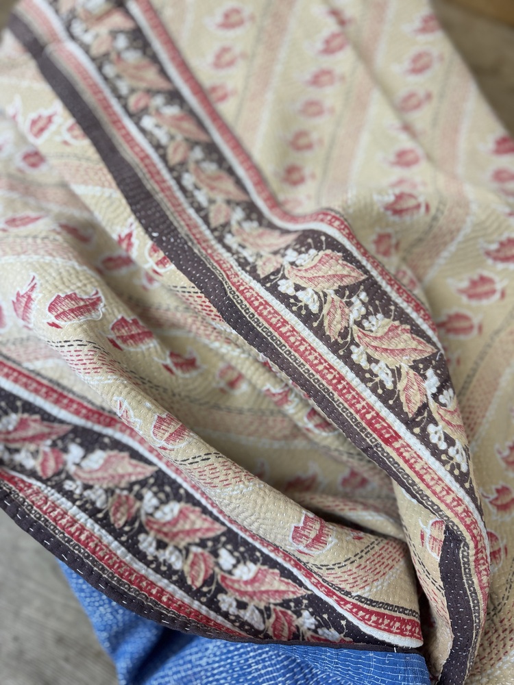 Exquisite vintage Kantha quilt featuring authentic hand-stitched Indian patchwork, responsibly sourced and perfect as unique homeware.
