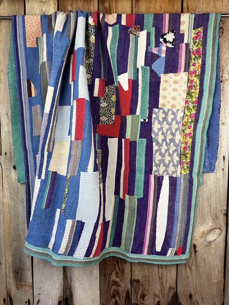 Exquisite vintage Kantha quilt featuring authentic hand-stitched Indian patchwork, responsibly sourced and perfect as unique homeware.