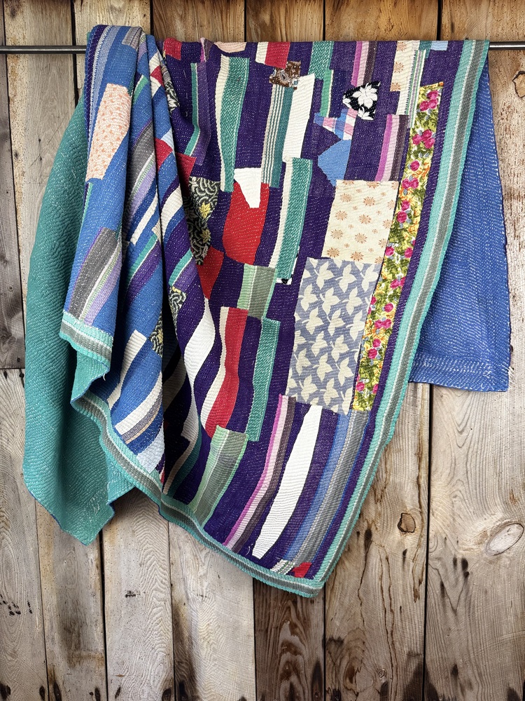 Exquisite vintage Kantha quilt featuring authentic hand-stitched Indian patchwork, responsibly sourced and perfect as unique homeware.