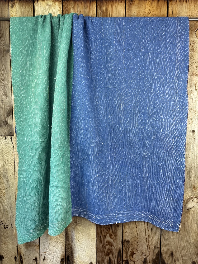 Exquisite vintage Kantha quilt featuring authentic hand-stitched Indian patchwork, responsibly sourced and perfect as unique homeware.