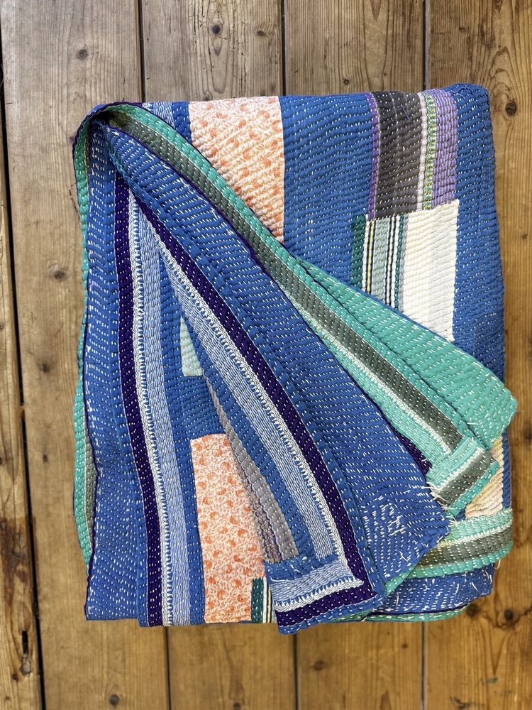 Exquisite vintage Kantha quilt featuring authentic hand-stitched Indian patchwork, responsibly sourced and perfect as unique homeware.
