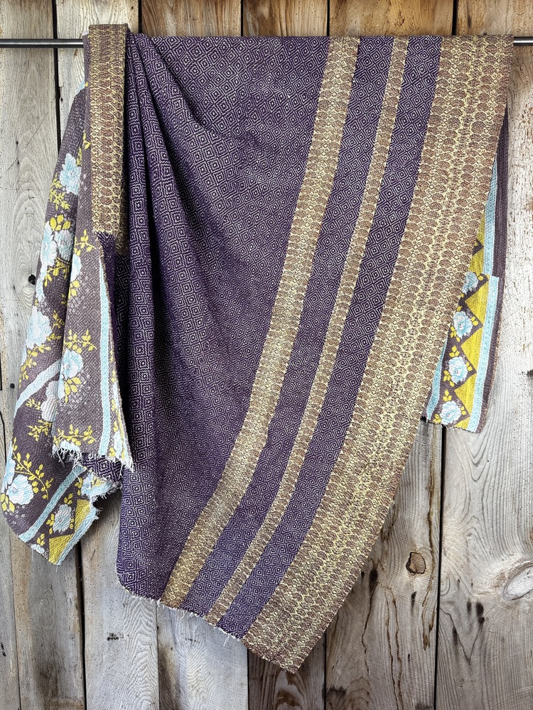 Exquisite vintage Kantha quilt featuring authentic hand-stitched Indian patchwork, responsibly sourced and perfect as unique homeware.