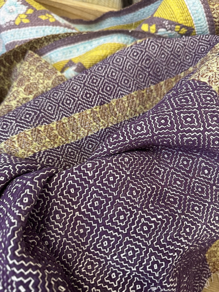 Exquisite vintage Kantha quilt featuring authentic hand-stitched Indian patchwork, responsibly sourced and perfect as unique homeware.