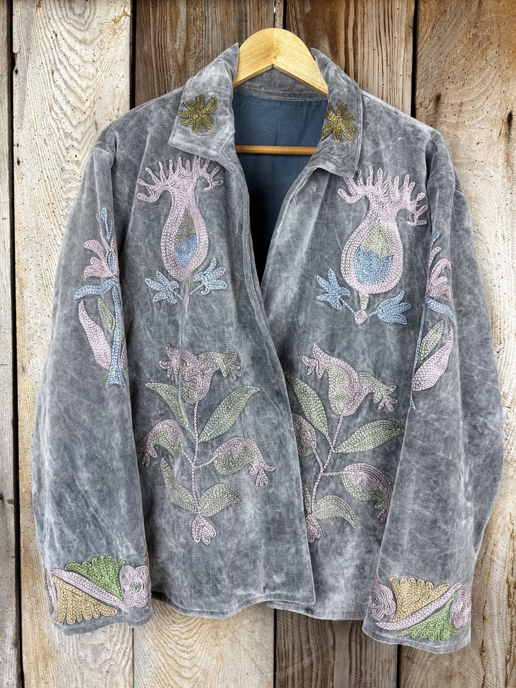 Hand embroidered cotton velvet jacket with soft texture, cosy easy fit, and intricate artisanal detailing.