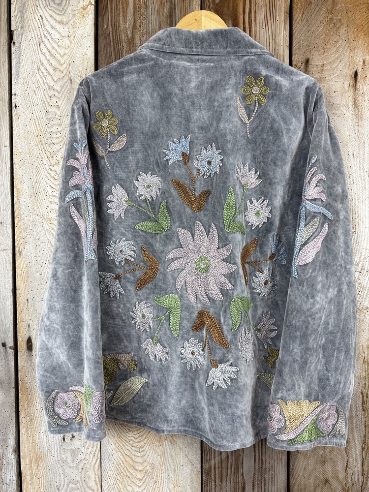 Hand embroidered cotton velvet jacket with soft texture, cosy easy fit, and intricate artisanal detailing.