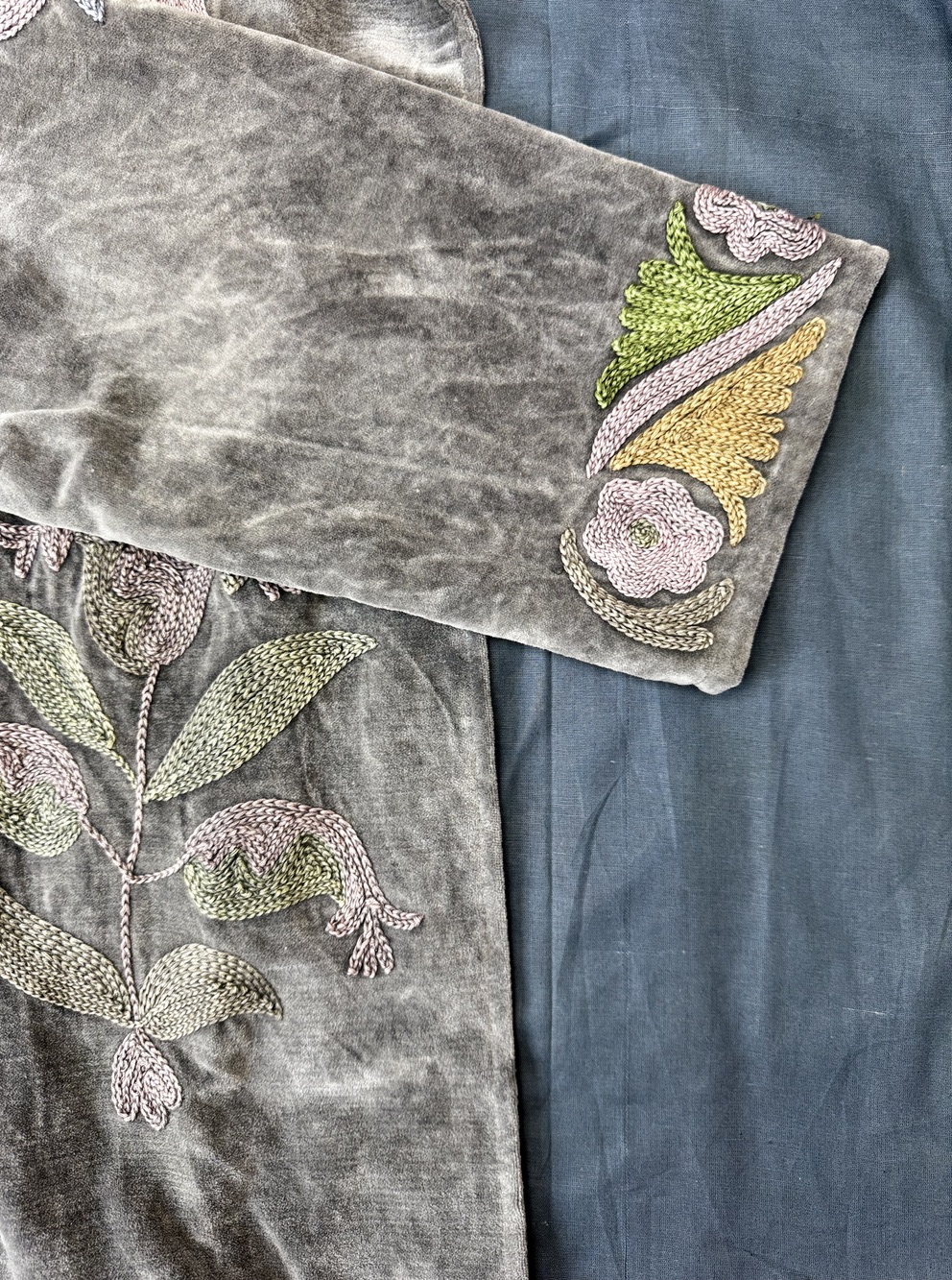 Hand embroidered cotton velvet jacket with soft texture, cosy easy fit, and intricate artisanal detailing.