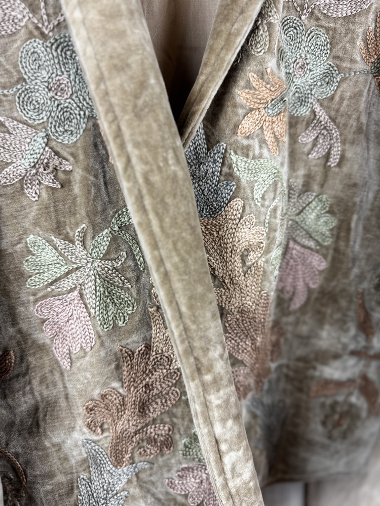 Hand embroidered cotton velvet jacket with soft texture, cosy easy fit, and intricate artisanal detailing.