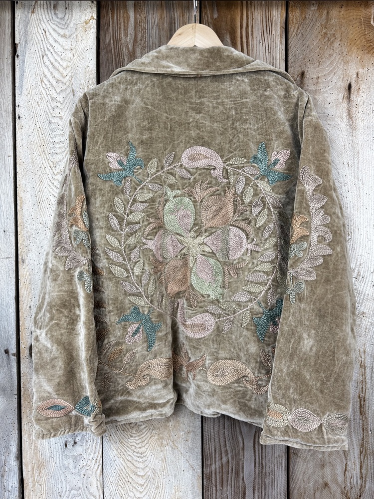 Hand embroidered cotton velvet jacket with soft texture, cosy easy fit, and intricate artisanal detailing.