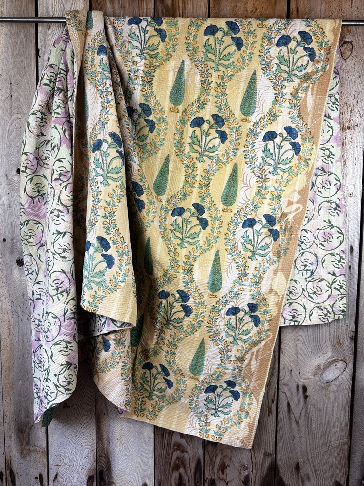 Exquisite vintage Kantha quilt featuring authentic hand-stitched Indian patchwork, responsibly sourced and perfect as unique homeware.