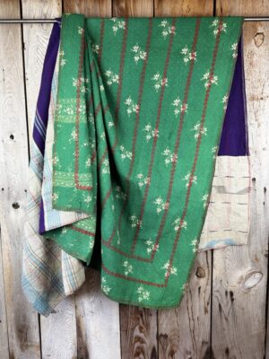 Exquisite vintage Kantha quilt featuring authentic hand-stitched Indian patchwork, responsibly sourced and perfect as unique homeware.