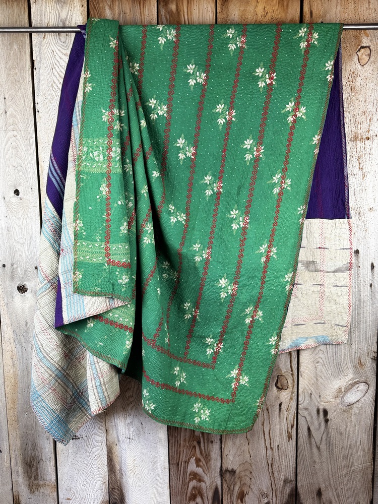 Exquisite vintage Kantha quilt featuring authentic hand-stitched Indian patchwork, responsibly sourced and perfect as unique homeware.