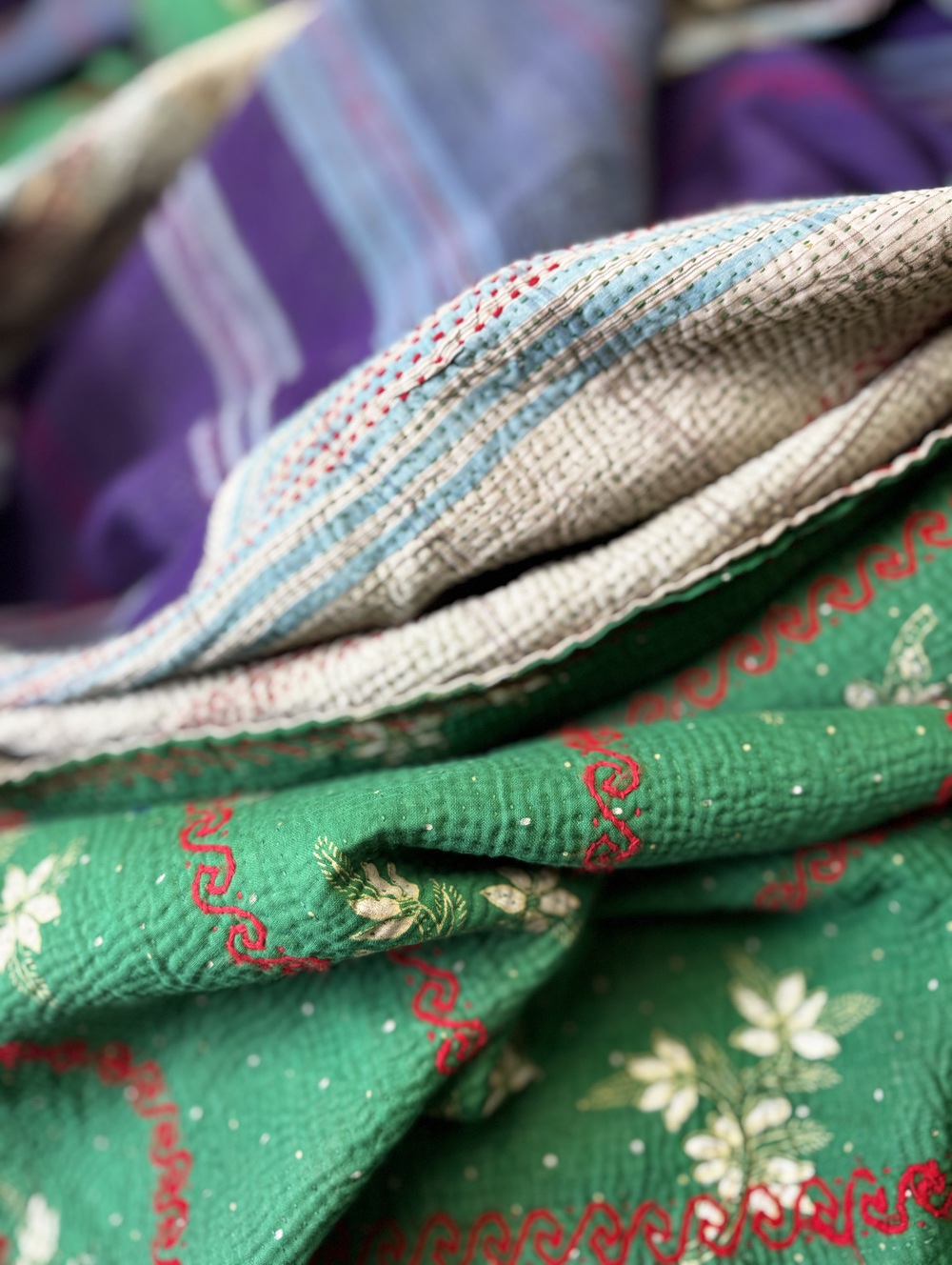 Exquisite vintage Kantha quilt featuring authentic hand-stitched Indian patchwork, responsibly sourced and perfect as unique homeware.