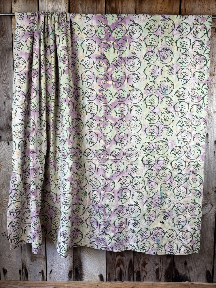 Exquisite vintage Kantha quilt featuring authentic hand-stitched Indian patchwork, responsibly sourced and perfect as unique homeware.