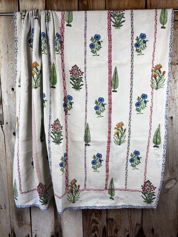 Exquisite vintage Kantha quilt featuring authentic hand-stitched Indian patchwork, responsibly sourced and perfect as unique homeware.