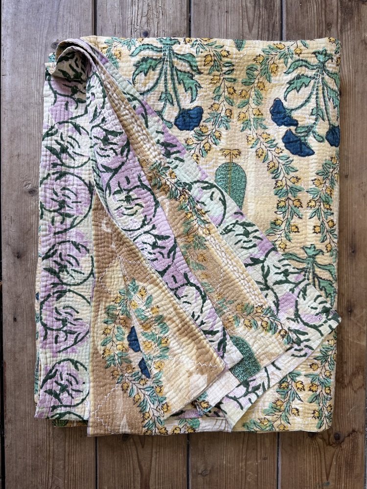 Exquisite vintage Kantha quilt featuring authentic hand-stitched Indian patchwork, responsibly sourced and perfect as unique homeware.