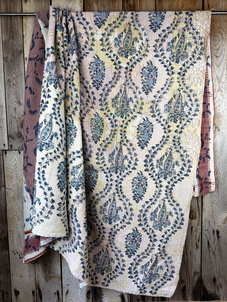 Exquisite vintage Kantha quilt featuring authentic hand-stitched Indian patchwork, responsibly sourced and perfect as unique homeware.