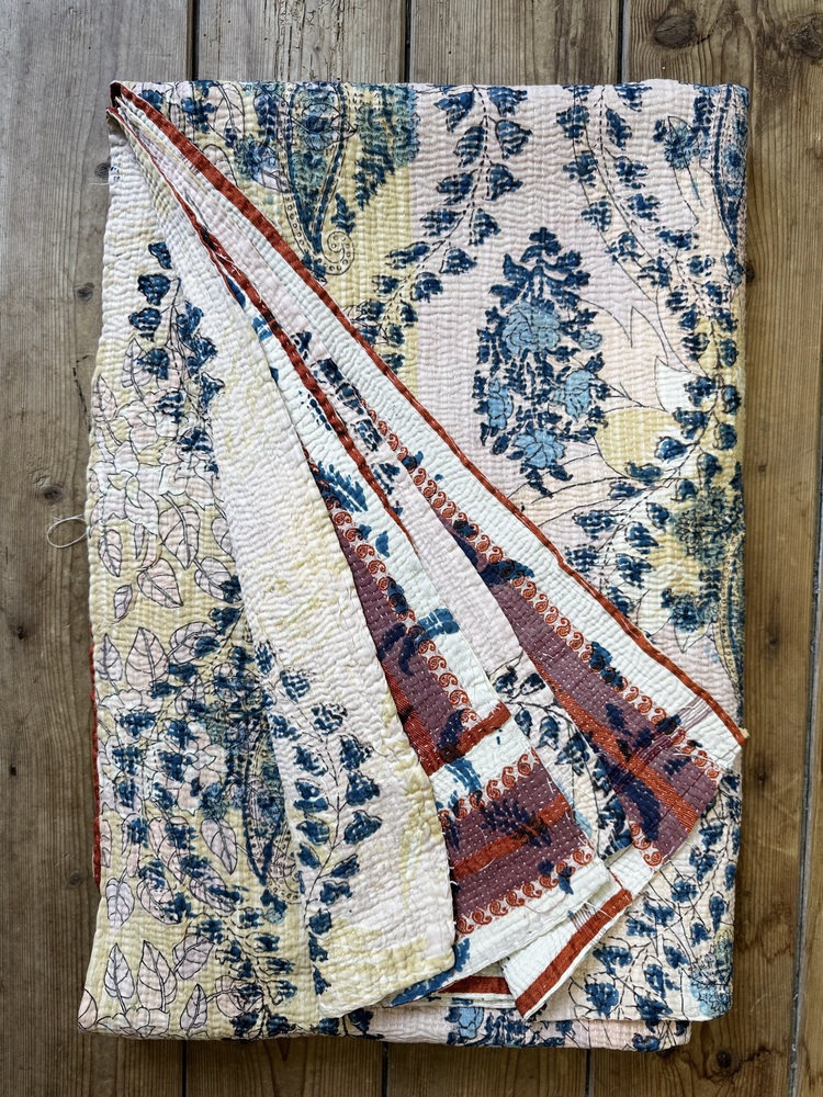 Exquisite vintage Kantha quilt featuring authentic hand-stitched Indian patchwork, responsibly sourced and perfect as unique homeware.