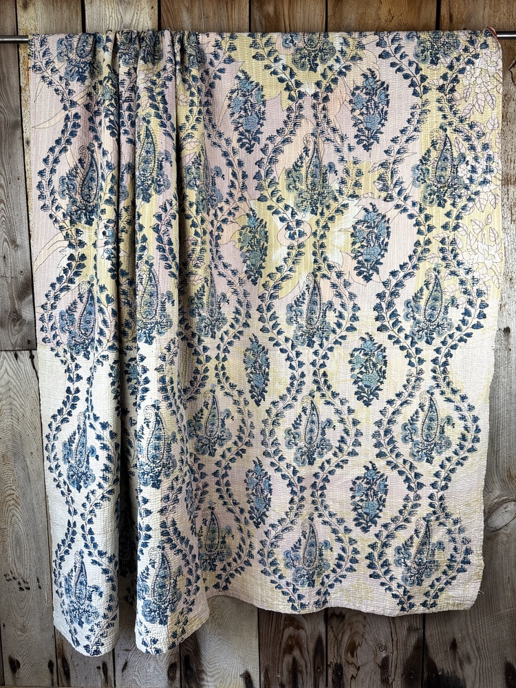 Exquisite vintage Kantha quilt featuring authentic hand-stitched Indian patchwork, responsibly sourced and perfect as unique homeware.