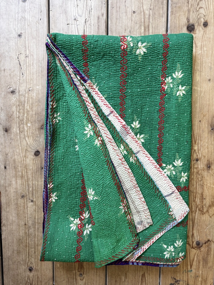 Exquisite vintage Kantha quilt featuring authentic hand-stitched Indian patchwork, responsibly sourced and perfect as unique homeware.