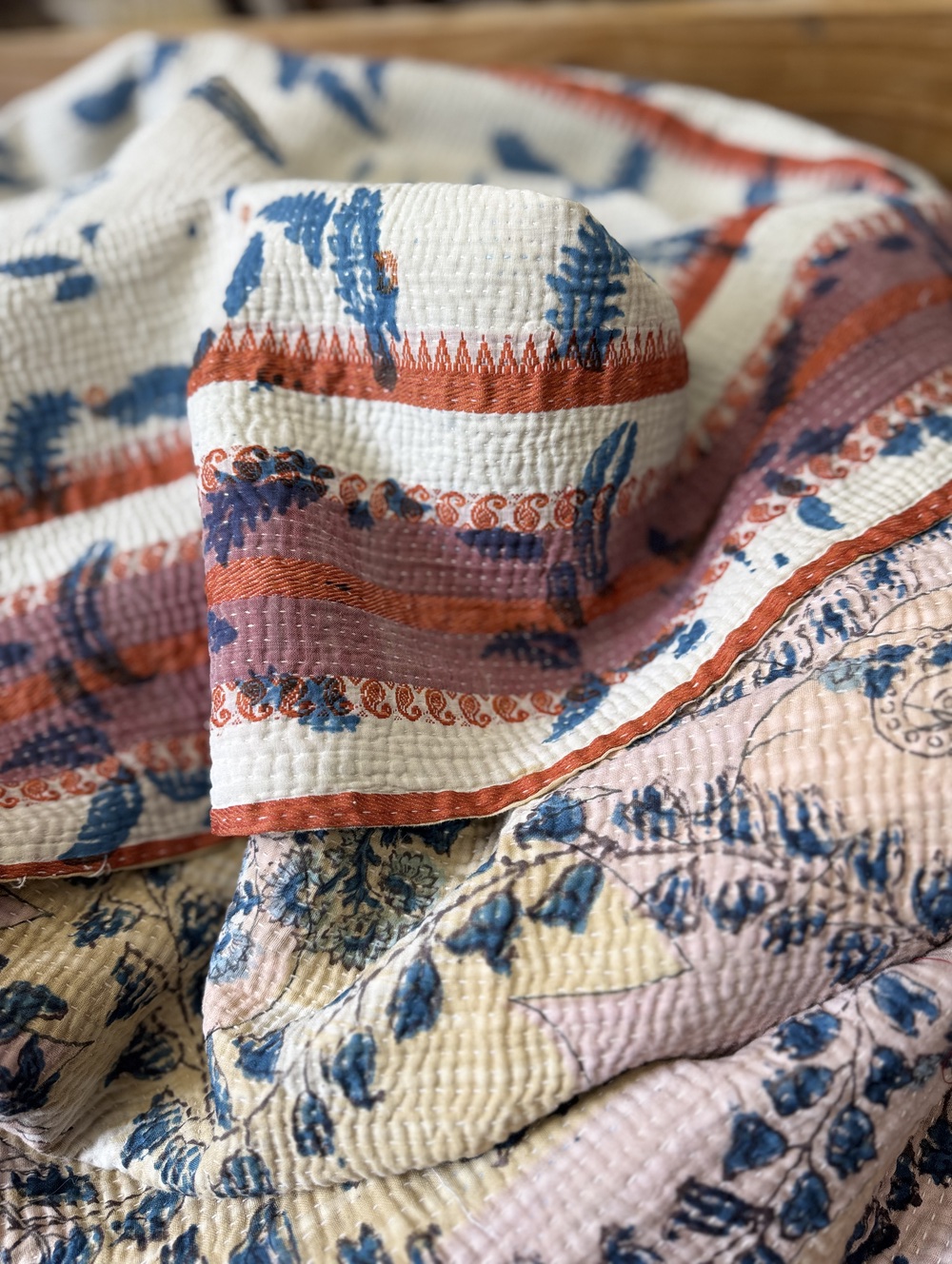 Exquisite vintage Kantha quilt featuring authentic hand-stitched Indian patchwork, responsibly sourced and perfect as unique homeware.