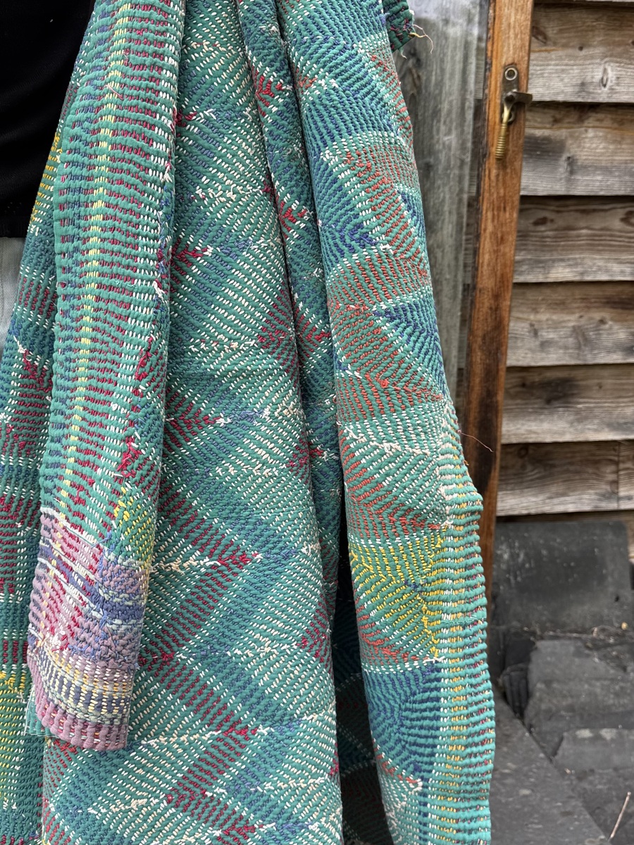 Exquisite vintage Lohori Kantha quilt featuring authentic hand-stitched Indian patchwork, responsibly sourced and perfect as unique homeware.