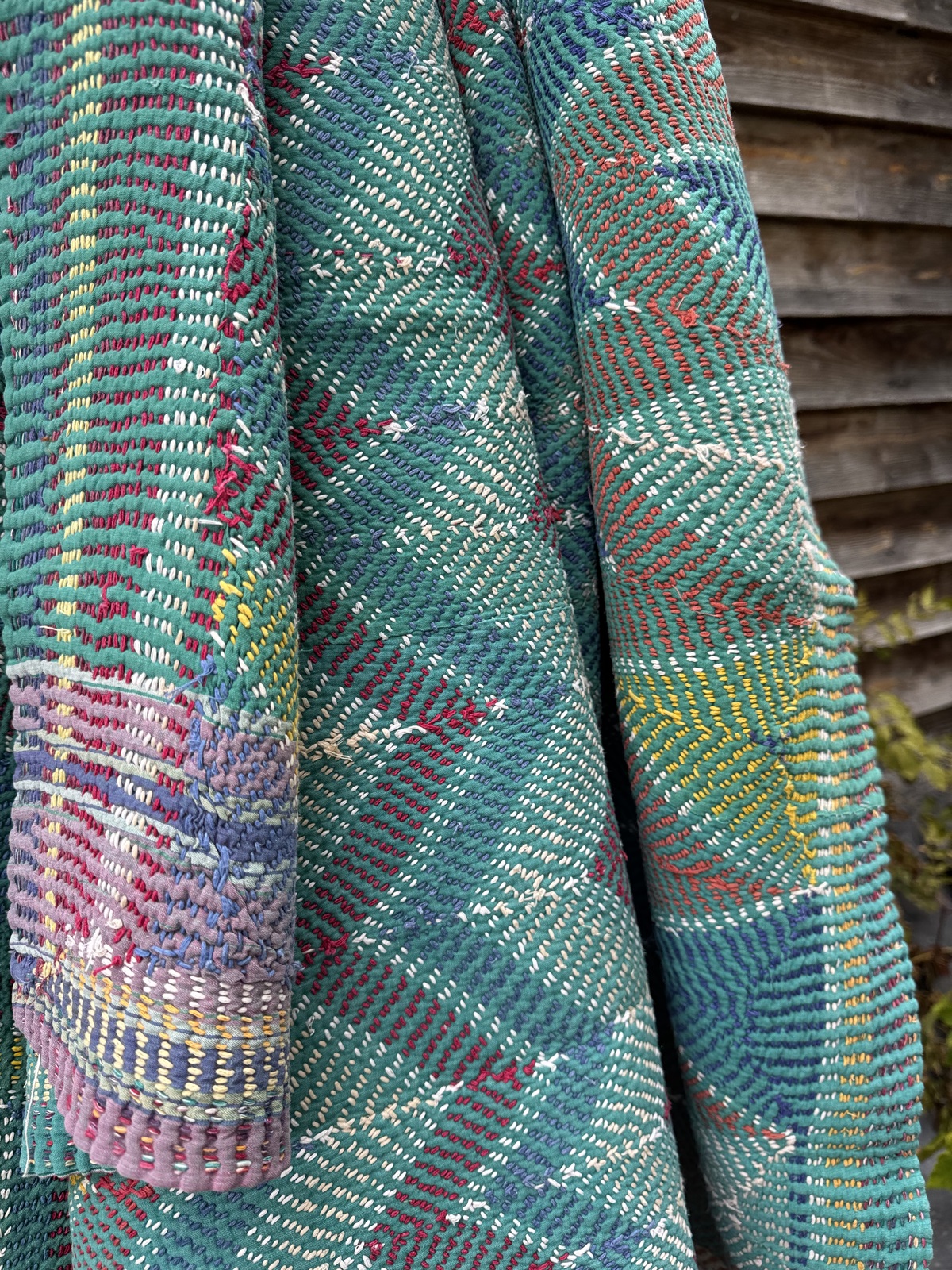 Exquisite vintage Lohori Kantha quilt featuring authentic hand-stitched Indian patchwork, responsibly sourced and perfect as unique homeware.