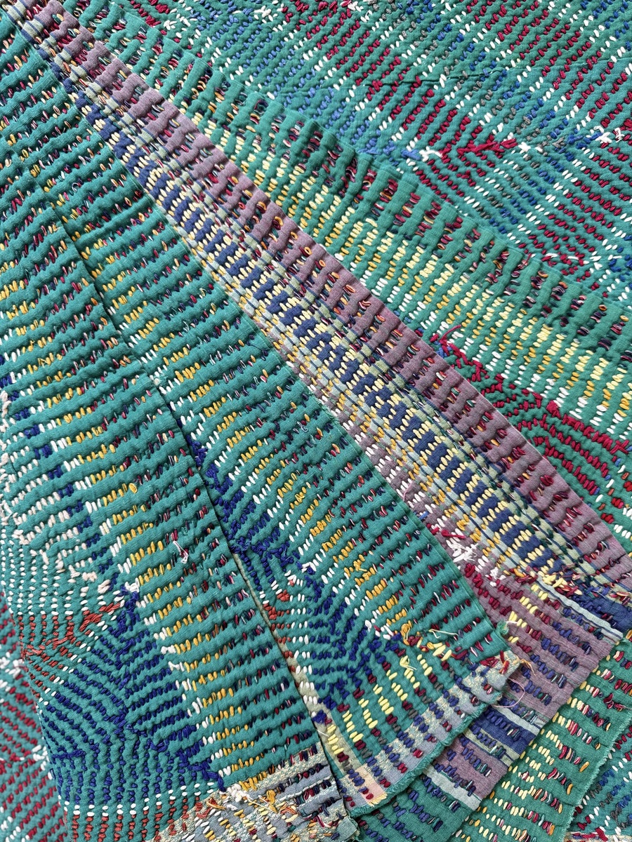 Exquisite vintage Lohori Kantha quilt featuring authentic hand-stitched Indian patchwork, responsibly sourced and perfect as unique homeware.