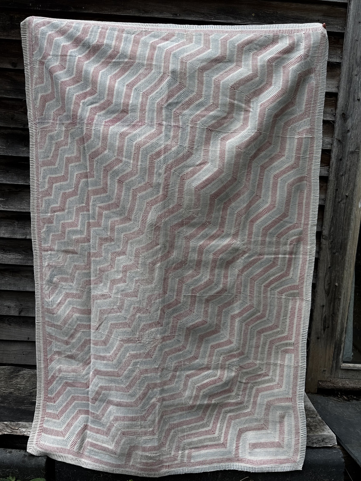 Exquisite vintage Lohori Kantha quilt featuring authentic hand-stitched Indian patchwork, responsibly sourced and perfect as unique homeware.
