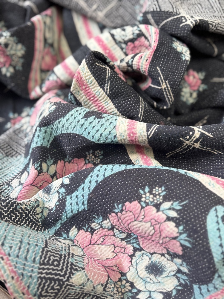 Exquisite vintage Kantha quilt featuring authentic hand-stitched Indian patchwork, responsibly sourced and perfect as unique homeware.